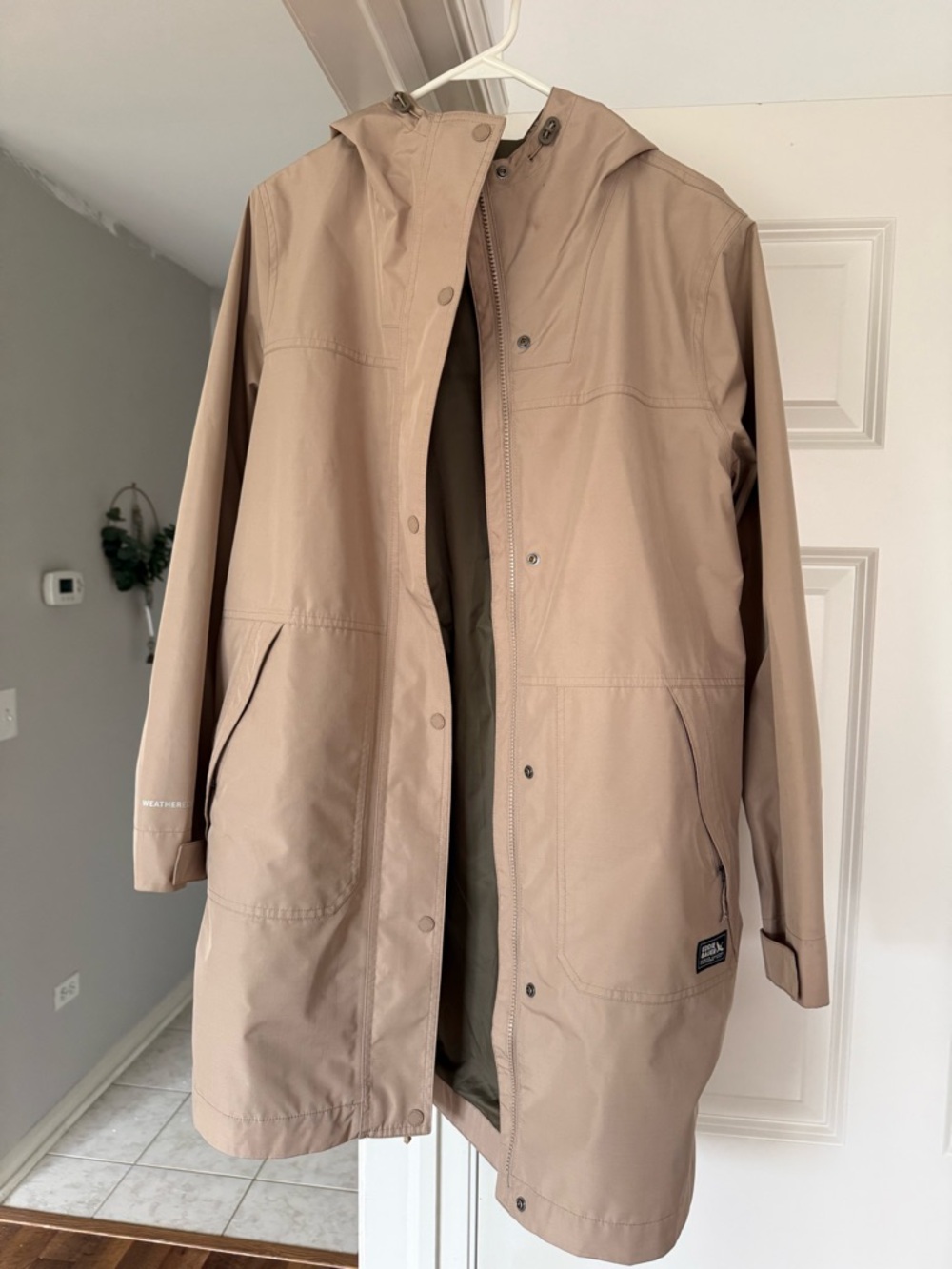 Eddie Bauer women’s Beige Hooded Raincoat